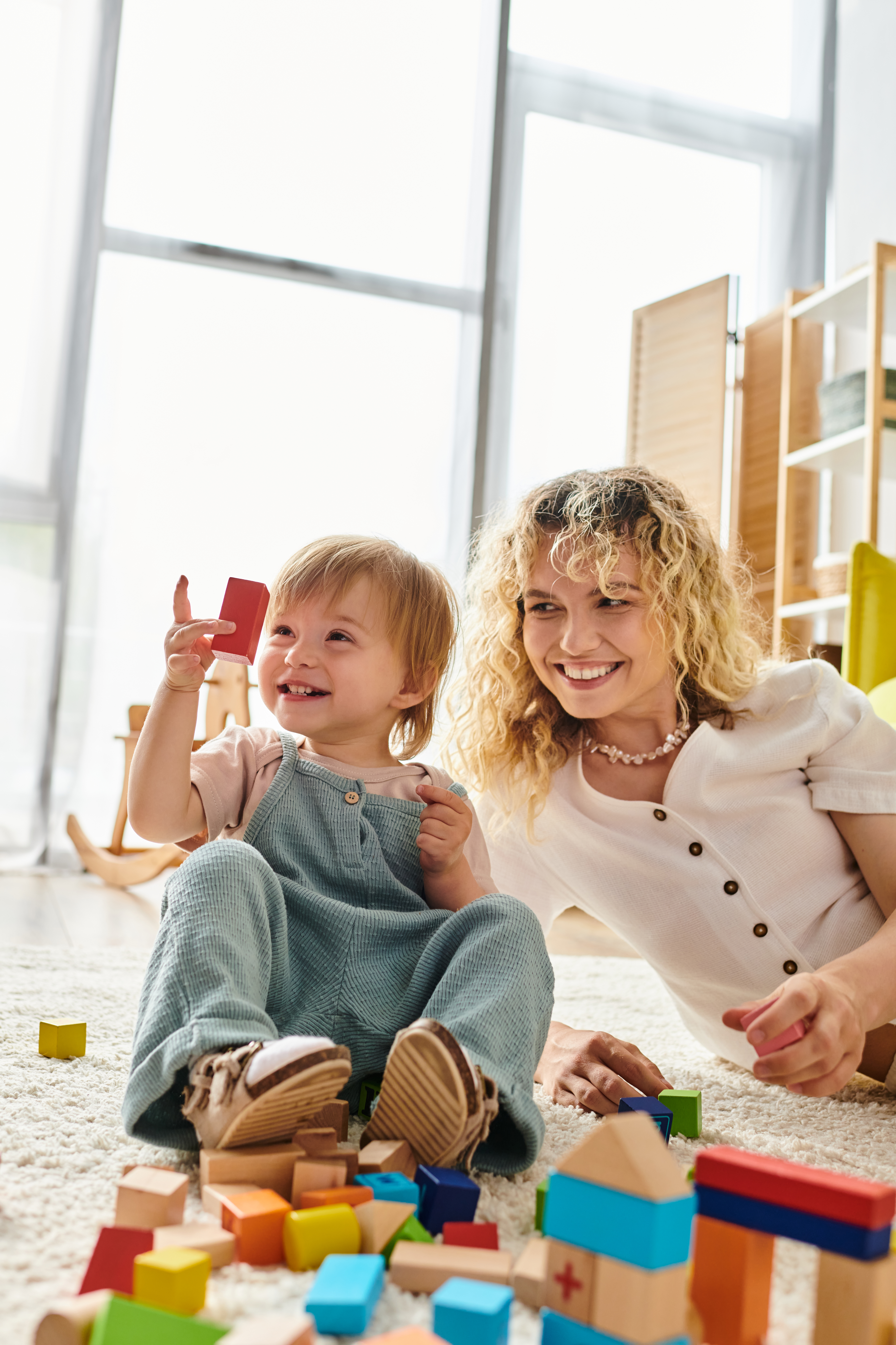 Preschool students building with blocks in learning center